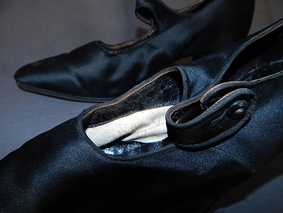 Edwardian Black Silk Satin Button Strap Mary Jane Pointed Toe Shoes
The shoes have been gently worn and are in good condition, with only some slight wear, scuff on the toes. These are truly beautiful quality made shoe!