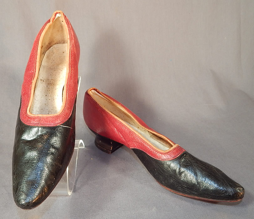 Victorian Red & Black Two Tone Leather Pointed Toe French Heel Slipper Shoes
This pair of antique Victorian era red and black leather two tone leather pointed toe French heel shoes date from 1870.