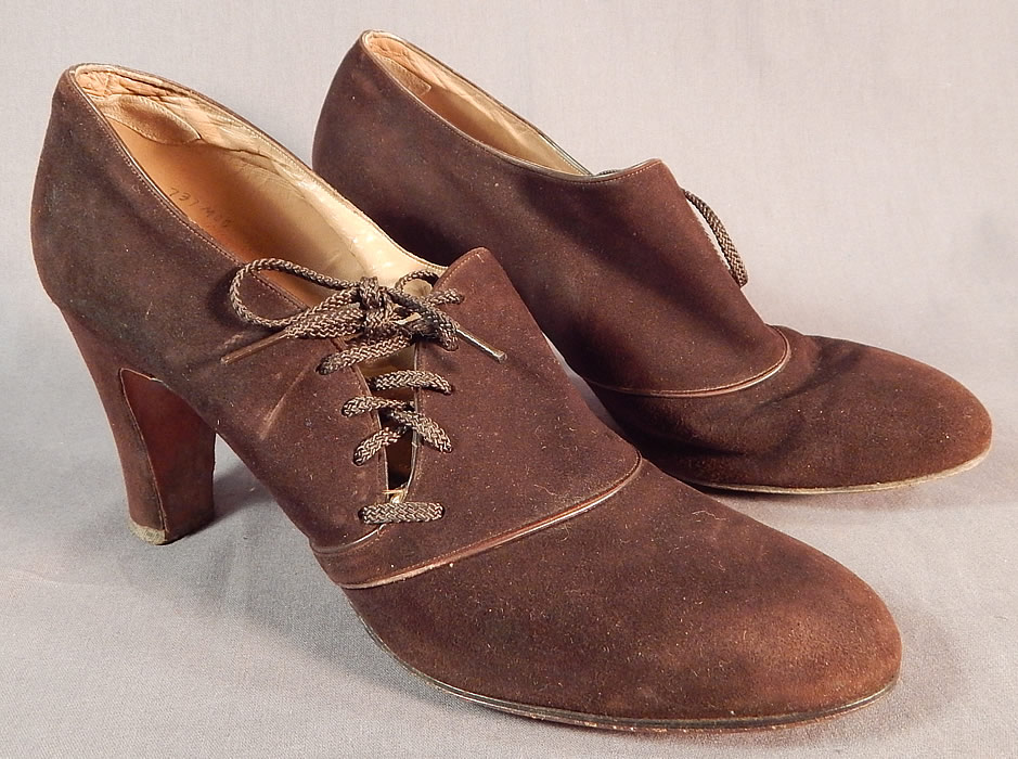 Vintage Marquise Footwear Brown Suede Leather Side Lacing Trim Art Deco Shoes
This pair of vintage Marquise Footwear brown suede leather side lacing trim Art deco shoes date from the 1930s.