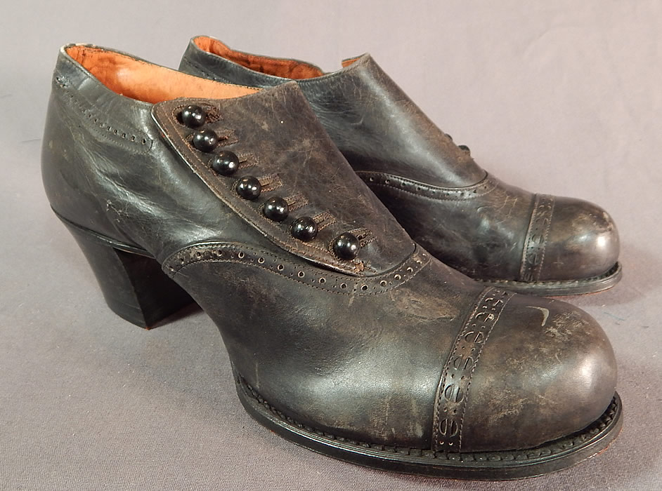 Edwardian Black Leather Low Side Button Bump Toe Womens Work Shoes
They are made of black leather with decorative punch work design accents.