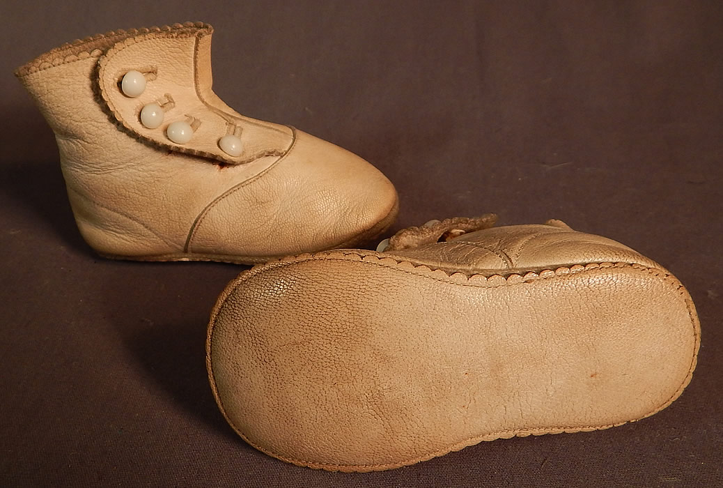 Edwardian Tan Kid Leather High Button Baby Boots Infant Childrens Shoes
These charming children's high top baby boots infant shoes have rounded toes and soft leather bottom soles.