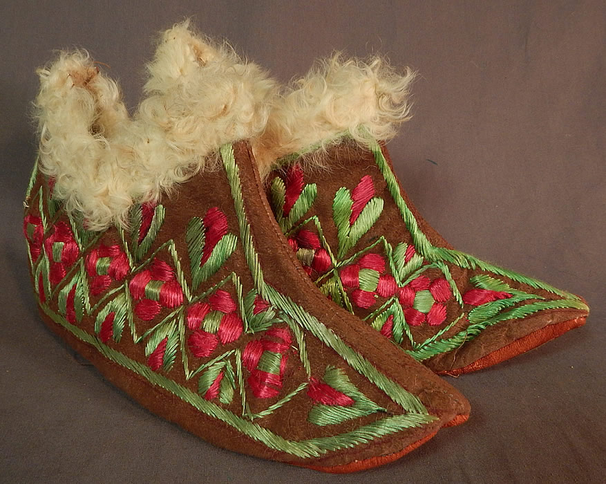 Vintage Hungarian Colorful Folk Embroidery Leather Curly Lamb Fur Lined Slippers
This pair of vintage antique Hungarian colorful folk embroidery leather curly lamb fur lined slippers date from 1900.