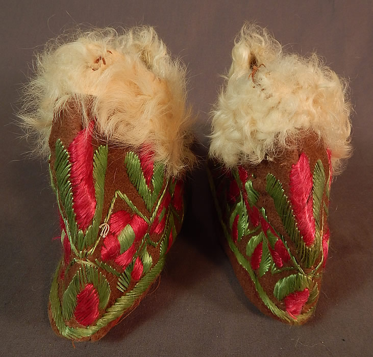 Vintage Hungarian Colorful Folk Embroidery Leather Curly Lamb Fur Lined Slippers
They are made of brown suede leather with colorful silk hand embroidered pink floral, green leaf designs.