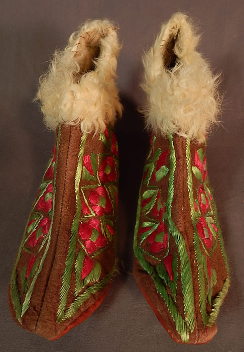 Vintage Hungarian Colorful Folk Embroidery Leather Curly Lamb Fur Lined Slippers
The shoes measure 10 1/2 inches long and 3 inches wide. 