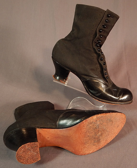 Victorian Womens Black Wool & Leather High Top Button Boots Clarice TC Shoe Co.
They have been gently worn and are in good wearable condition, with only some creasing along the leather instep, toes, some dust on the wool fabric and the buttons have been moved over to be made larger leaving tiny pin holes along the sides. These are truly a beautiful quality made antique boot! 