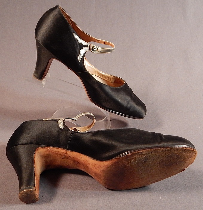 Vintage Peacock Shoe Art Deco Black Silk Satin Silver Button Strap Mary Jane Shoes
They have been gently worn and have some minor wear along the leather straps. These are truly a rare find of wearable Art Deco shoe art! 