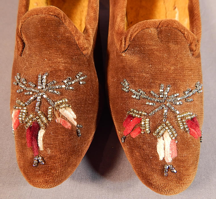 Victorian Brown Velvet Chenille Embroidered Steel Cut Beaded Slipper Shoes
They are in good condition and have been gently worn, with only some wear to the inside batting lining and a a few missing beads (see close-ups)