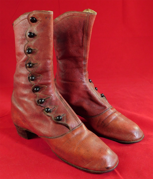 Victorian Rare Red Leather Scalloped High Top Button Boots Shoes
They are made of a red leather with decorative stitching details. 