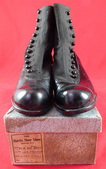 Unworn Edwardian Black Wool Cloth Leather Button Boots & Shoe Box
These womens beautiful black boots have rounded bulbous toes, 11 black shoe buttons along the side for closure and black stacked wooden cube heels. They come in the original shoe box covered with a wonderful spider web cobweb graphics foil paper from "The Harris Shoe Store" in Dover, New Jersey and are stamped on the outside of the box a European size 34. 