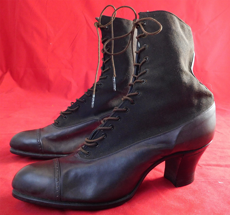 Unworn Edwardian Black Wool Cloth Leather Laceup Boots
They are made of black gun metal dark grayish color wool cloth fabric upper boot and black leather lower shoe with decorative punch work across the toes.