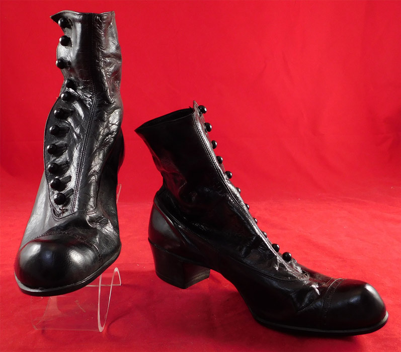 Victorian Unworn Womans Black Kid Leather High Top Button Boots
The boots measure 7 inches tall, 9 1/2 inches long and 3 inches wide, with a 1 1/2 inch high heel. These antique boots are difficult to size for today's foot, but are approximately a US size 6 narrow width.