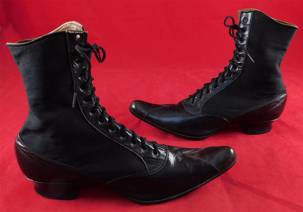 Victorian F. Mayer B & S Co. Unworn Black Wool Cloth Leather Laceup Boots
This pair of unworn antique Victorian era F. Mayer B & S Co. black wool cloth leather lace-up boots date from 1880. They are made of a black cloth wool fabric and black leather bottom shoe with decorative trim accents. These beautiful black boots have pointed toes, the black shoe string laces and low stacked wooden black French Louis XV heels. 