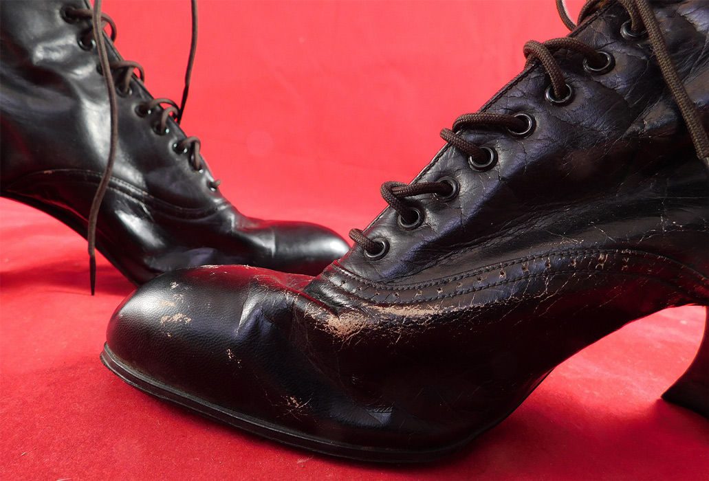 Victorian Unworn Black Leather High Top Lace-up French Spool Heel Boots
They are old store stock, in unworn good wearable condition, with some scuffs on the leather from storage and a small piece of the tongue inside is torn