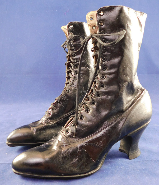 Victorian Unworn Black Leather High Top Lace-up French Spool Heel Boots
These beautiful boots have pointed toes, the original black shoe string laces for closure (one shorter than the other) and stacked wooden black French spool heels.