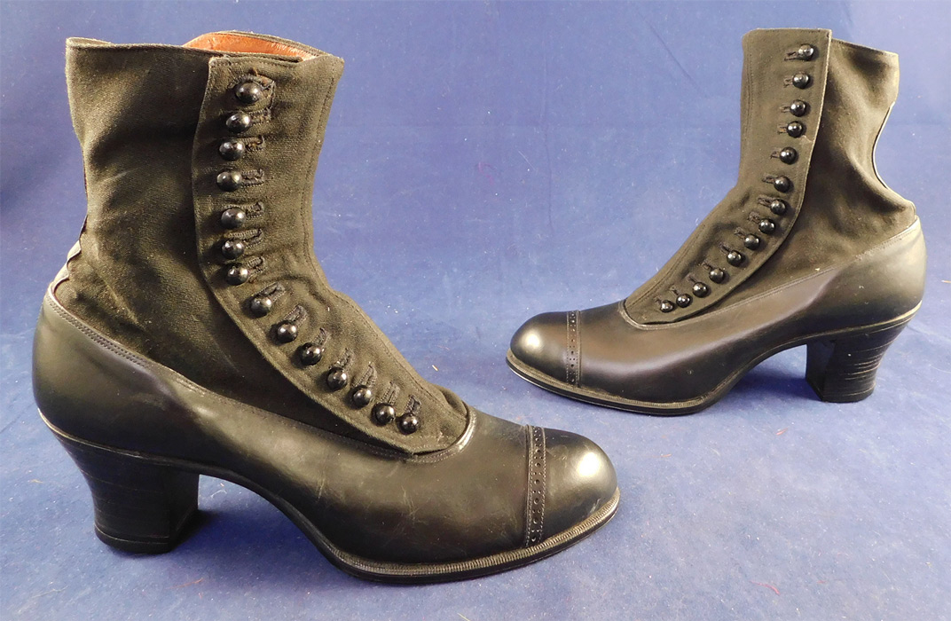 Unworn Edwardian Gunmetal Gray Black Leather Cloth High Top Button Boots & Shoe Box
The boots measure 8 inches tall, 9 1/2 inches long, 2 3/4 inches wide, with 2 1/4 inch high heels. These antique boots are difficult to size for today's foot, but my guess would be approximately a US size 6 or 7 narrow width.