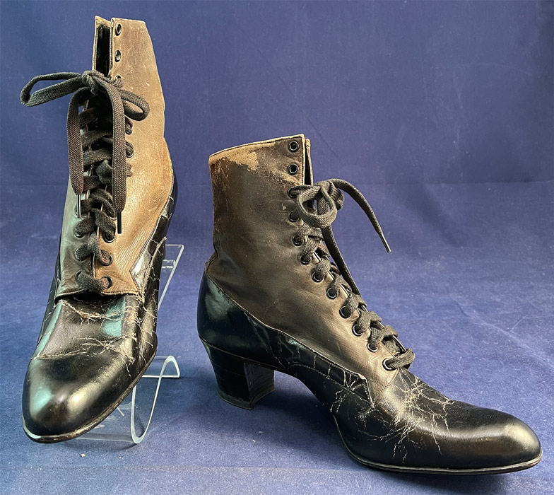 Vintage The Hennessy Shoe Co. Unworn Black & Gray Leather Lace-up Boots
This pair of antique Edwardian era vintage The Hennessy Shoe Co. unworn black and gray leather lace-up boots date from 1905. They are made of a two tone gray leather upper boot and black leather bottom shoe. 