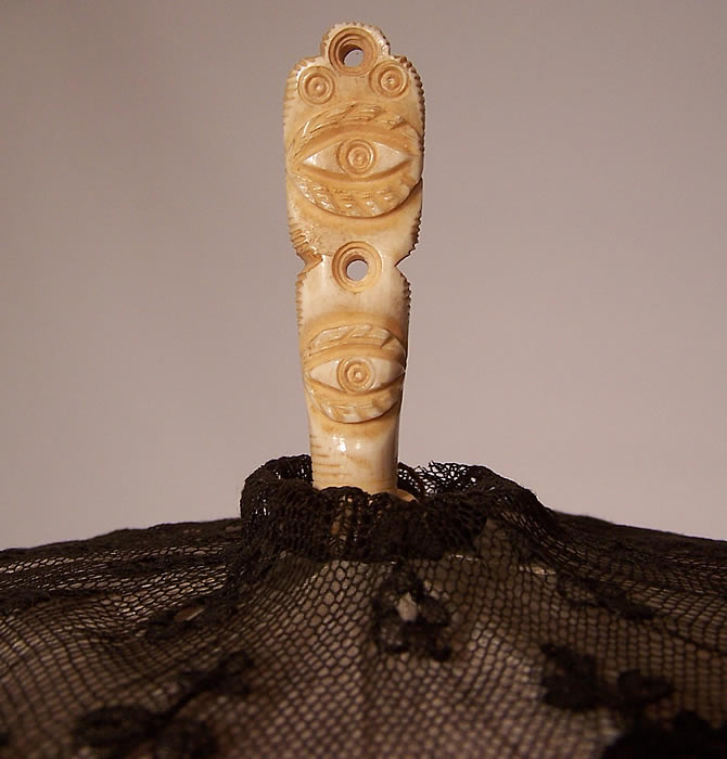 Victorian Antique Black Chantilly Lace Carved Masonic Eye of God Handle Parasol close up.