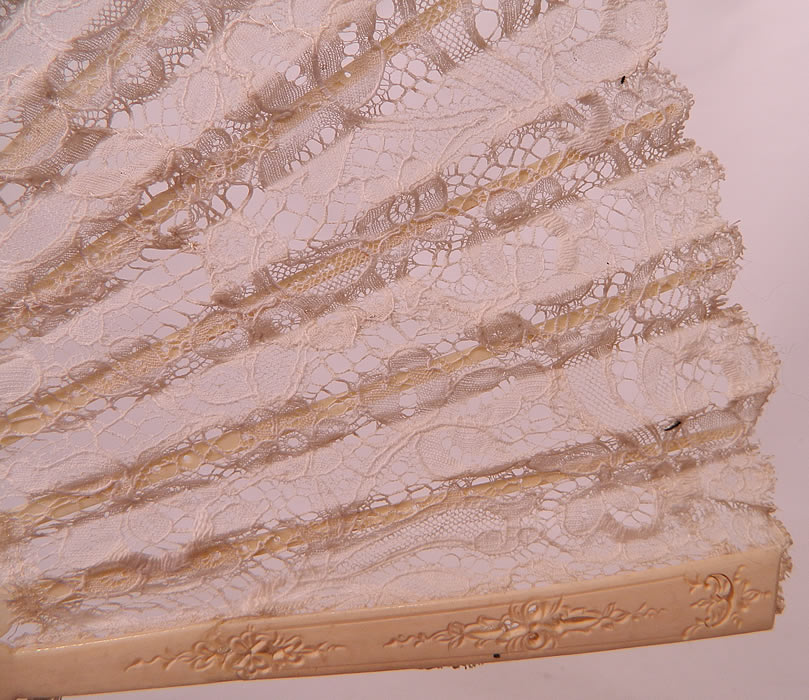 Antique Victorian Bridal Wedding White Bobbin Lace Pleated Folding Fan. This beautiful bridal wedding folding fan has a silver loop ring at the bottom holding the fan together, with a cream color silk ribbon for carrying.