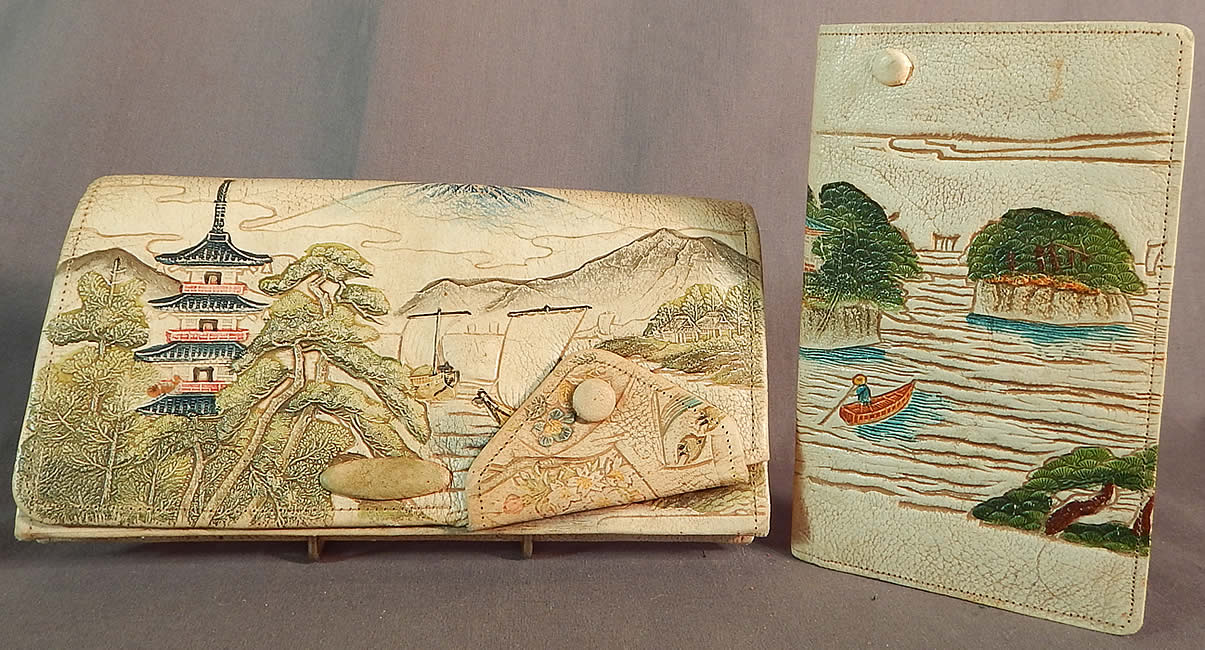 Vintage Antique Japanese Hand Tooled Leather Painted Clutch Purse & Wallet
This vintage Japanese hand tooled leather painted clutch purse and wallet set dates from the 1920s. It is made of an off white cream color hand tooled leather with hand painted detail accents. 