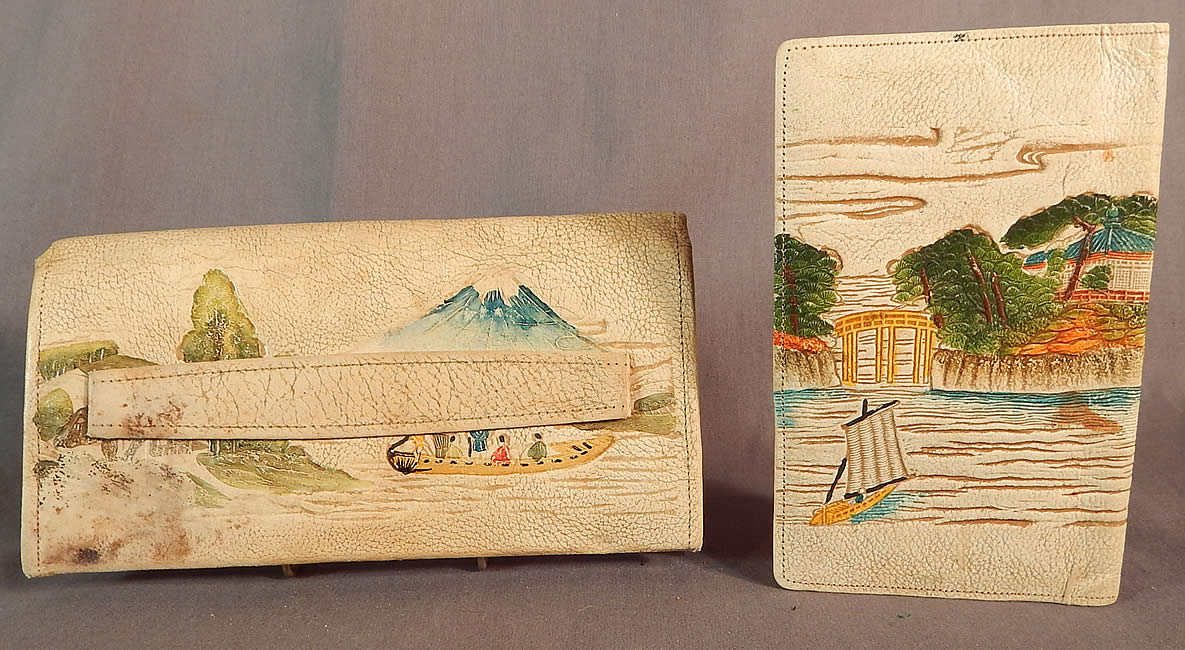 Vintage Antique Japanese Hand Tooled Leather Painted Clutch Purse & Wallet
The purse has Mount Fuji, a pagoda temple shrine, trees, ships on the front and Mount Fuji with a small boat full of people on the back and more mountainous shrines inside. 