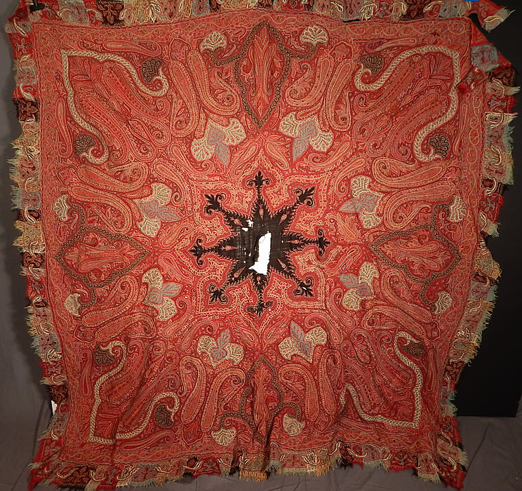 Victorian Antique Kashmir Hand Woven Wool Embroidered Pieced Paisley Shawl
This Victorian era antique Kashmir hand woven wool embroidered pieced paisley shawl dates from the early 19th century. It is made of a soft fine pashmina goats fleece wool, hand stitched and embroidered with colorful natural dyed wool done in strong vivid vibrant colors of red, orange and blue. 