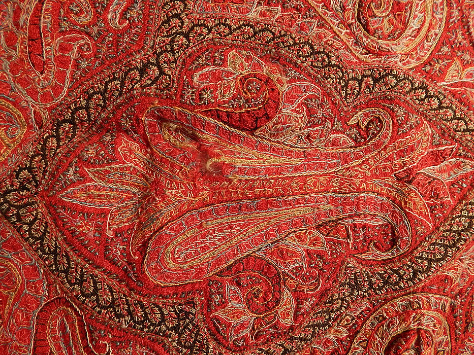 Victorian Antique Kashmir Hand Woven Wool Embroidered Pieced Paisley Shawl
It is in fair as-is condition, with several small holes, fraying along the border seam and the black wool center is ripped, frayed which needs mending or replacing (see close-ups). This is truly an extraordinary and rare piece of wearable paisley textile art!