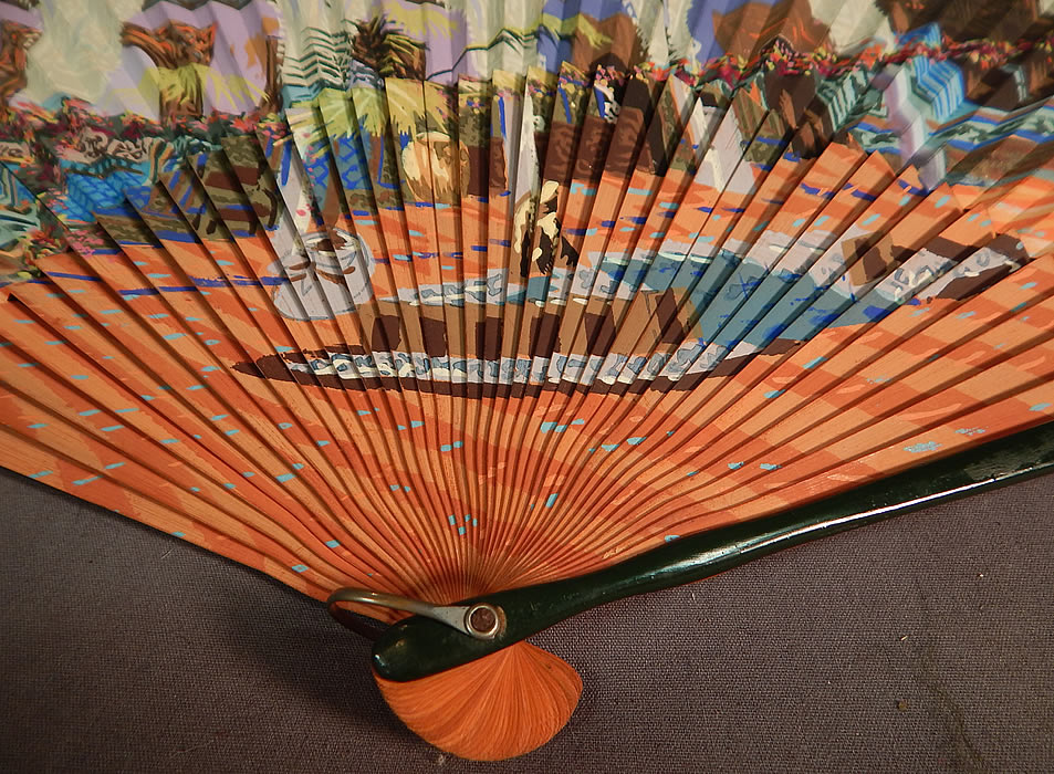 Vintage Hand Painted Spanish Courtyard Pleated Paper Spain Souvenir Folding Fan
This beautifully hand painted souvenir folding fan from Spain has a silver ring, rivet on the bottom holding the wooden sticks together and painted green wooden guards. 