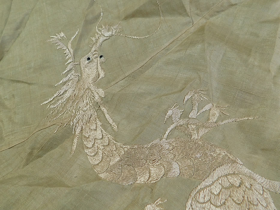 Edwardian Embroidered Japanese Dragon Pongee Raw Silk Parasol Fabric Cover
It is made of an off white cream color pongee raw silk fabric, with silk raised padded satin stitch hand embroidery work of a long serpentine dragon chasing a pearl.
