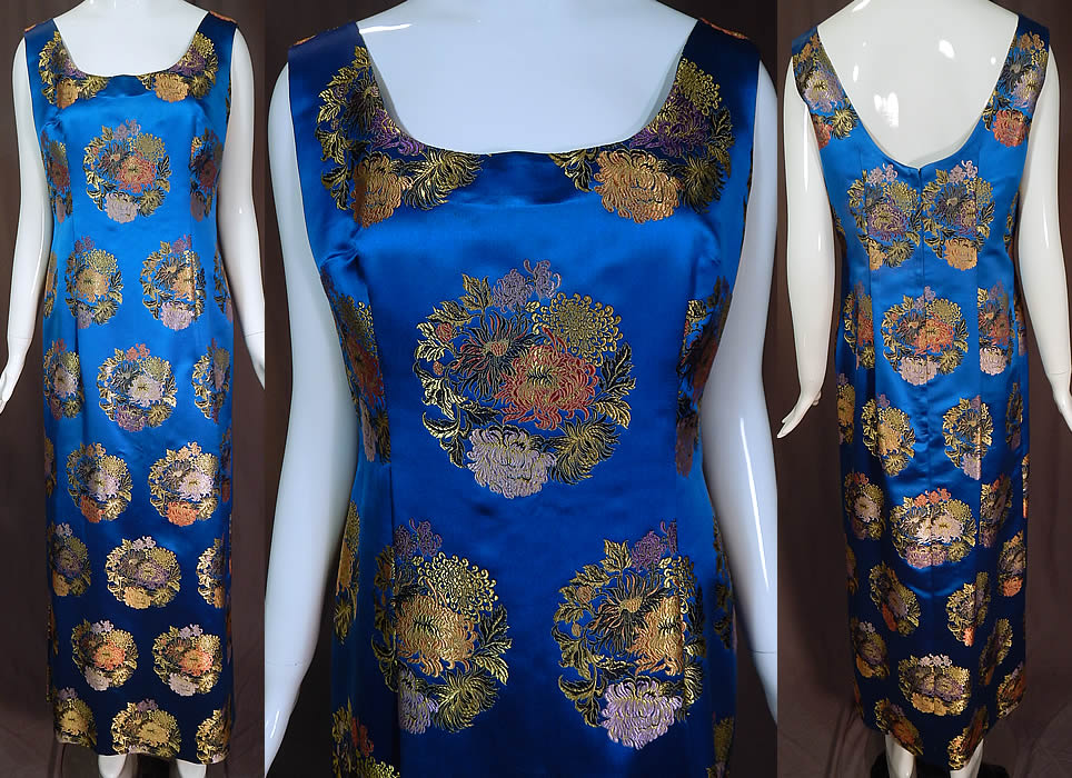 Vintage Blue Silk Chinese Chrysanthemum Brocade Sheath Dress Evening Gown
This vintage blue silk Chinese chrysanthemum brocade sheath dress evening gown dates from the late 1960s. It is made of bright royal blue color luxurious silk satin brocade fabric with a colorful damask weave woven chrysanthemum flower roundels medallions. 