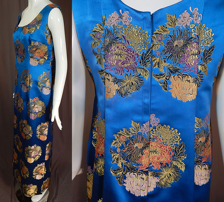 Vintage Blue Silk Chinese Chrysanthemum Brocade Sheath Dress Evening Gown
This beautiful blue Chinese inspired evening gown maxi dress has a fitted wiggle sheath style, is a long floor length with side slits on the skirt, sleeveless, low rounded scoop necklines, a back zipper closure and is unlined. 