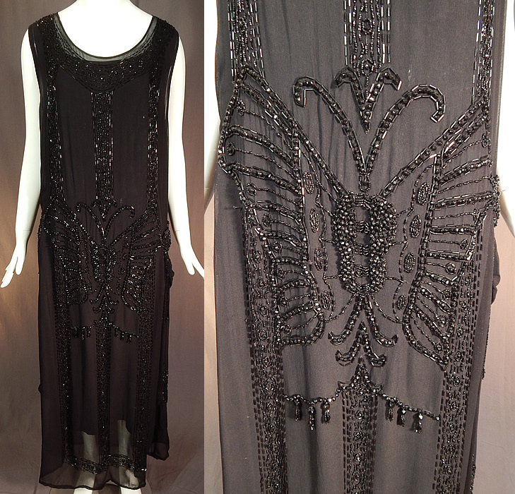 Vintage Art Deco Black Silk Beaded Butterfly Fringed Flapper Dress
This amazing Art Deco vintage black silk beaded butterfly fringed flapper dress dates from the 1920s. It is made of a black sheer silk chiffon fabric, with black jet beading creating a large beautiful beaded butterfly on both the front and back.