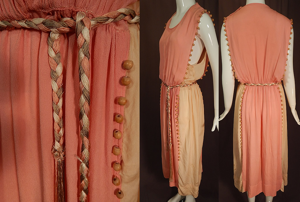 Vintage Grecian Goddess Pink Silk Crepe Wood Beaded Belted Tabard Tunic Dress
This gorgeous Grecian goddess gown has a tabard tunic pinafore layered style, with wide arm holes, sleeveless, a braided tricolor pink, gray, white silk rope belted sash tie with tassel ends and side snap closures with an inside bodice lining front snap closure. 