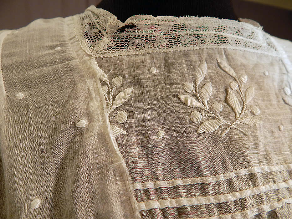 Edwardian Embroidered White Cotton Batiste Laurel Greek Key Polka Dot Embroidered Dress
It is in good condition, with only a small frayed hole in the lace neckline trim and side skirt (see close-ups). This is truly a wonderful piece of wearable antique lace art which could be worn as a wedding or graduation dress!