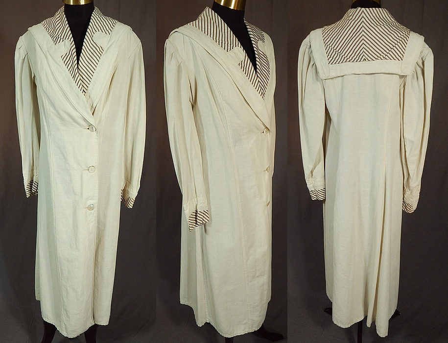 Vintage Linen Striped Sailor Shawl Collar Womens Duster Driving Motoring Coat
This vintage Edwardian era linen striped sailor shawl collar womens duster driving motoring coat dates from 1918. It is made of an off white cream color linen fabric, with a brown striped cotton fabric insert trimming the sleeve cuffs and lapel collar.