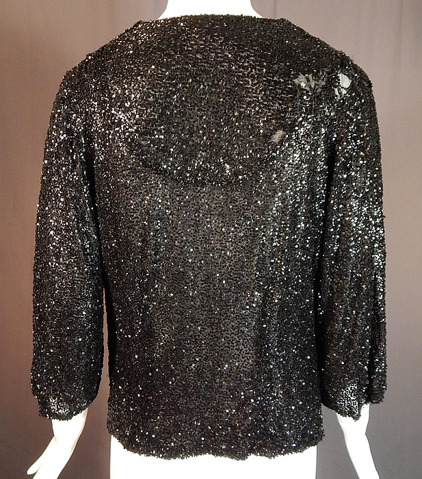 Vintage Art Deco Fully Black Beaded Flapper Evening Coat Crop Bolero Jacket
This amazing Art Deco vintage fully black beaded flapper evening coat crop bolero jacket dates from the 1930s. 