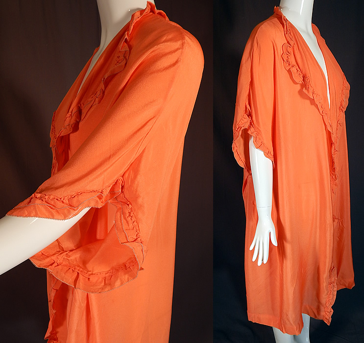 Vintage Orange Silk Ruffle Boudoir Lingerie Flapper Peignoir Dressing Gown Robe
This lovely lingerie peignoir dressing gown robe is loose fitting, with a fold over lapel collar, 3/4 length sleeves, an open front with no closure and is unlined. 