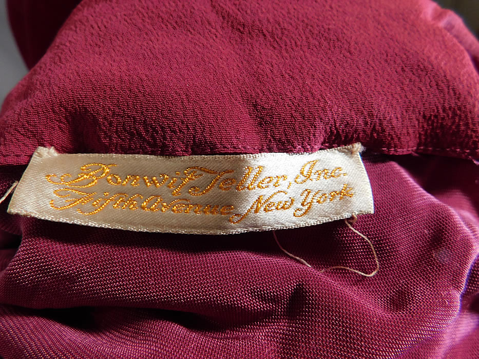 Vintage Bonwit Teller NY Burgundy Red Velvet Gold Soutache Trim Gown Dress
There is a "Bonwit Teller, Inc. Fifth Avenue New York" department store label sewn inside.