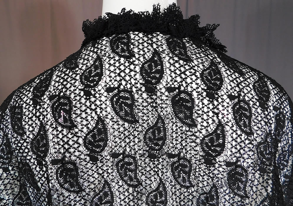 Victorian Antique Black Lace Dolman Mantle Pelerine Shawl Cloak Cape
The cape measures 40 inches long in the front, 28 inches long in the back and 20 inches across the back shoulders.