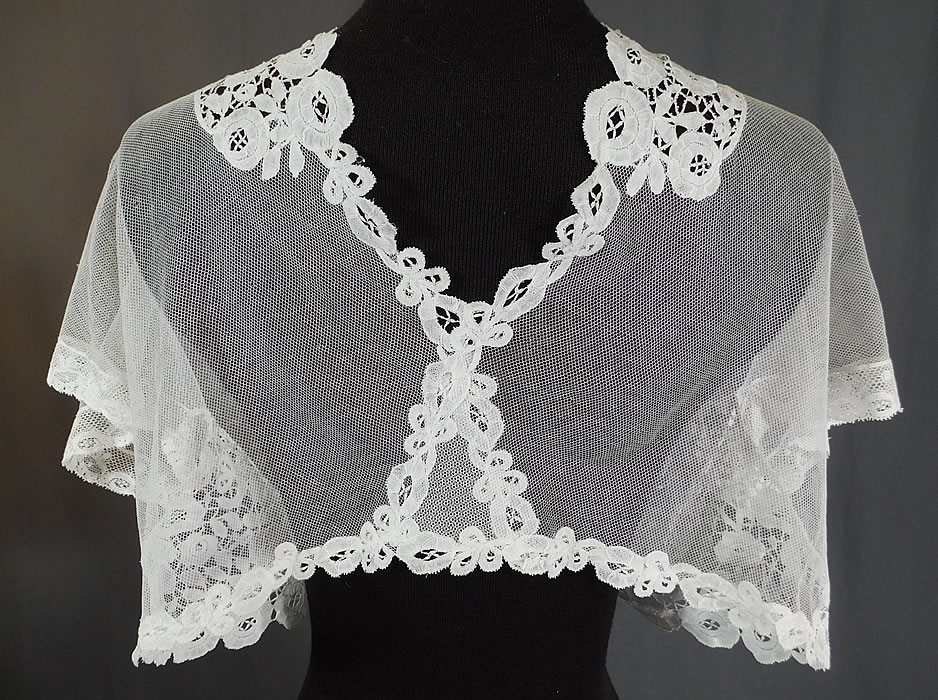 Edwardian White Net Duchesse Bobbin Tape Lace Bolero Jacket Shrug Top
The top measures 14 inches long, with a 36 inch bust. 