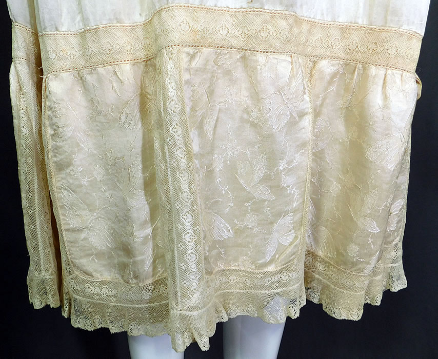 Vintage Cream Silk Damask Butterfly Rosette Lace Lingerie Negligee Chemise Slip Dress
It is in good condition, with only a frayed open seam underneath the layered skirt bottom ruffle lining. This is truly a wonderful piece of flapper lingerie wearable art! 