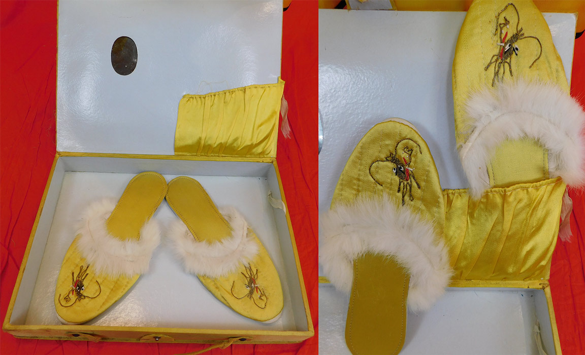 Vintage Japanese Yellow Nylon Gold Couching Embroidered Dragon Pajamas Set
The robe measures 48 inches long, with a 40 inch bust, 20 inch long sleeves and a 17 inch back. The slippers measure 9 1/2 inches long, 3 inches wide and the storage gift box is 14 by 10 inches. It is in good condition and appears to have never been worn. The storage gift box is in fair as-is condition with water spot stains, a broken strap and snap closure, fraying along the side edging and tarnish to the mirror. This is truly a wonderful piece of Japanese WWII era souvenir wearable art.