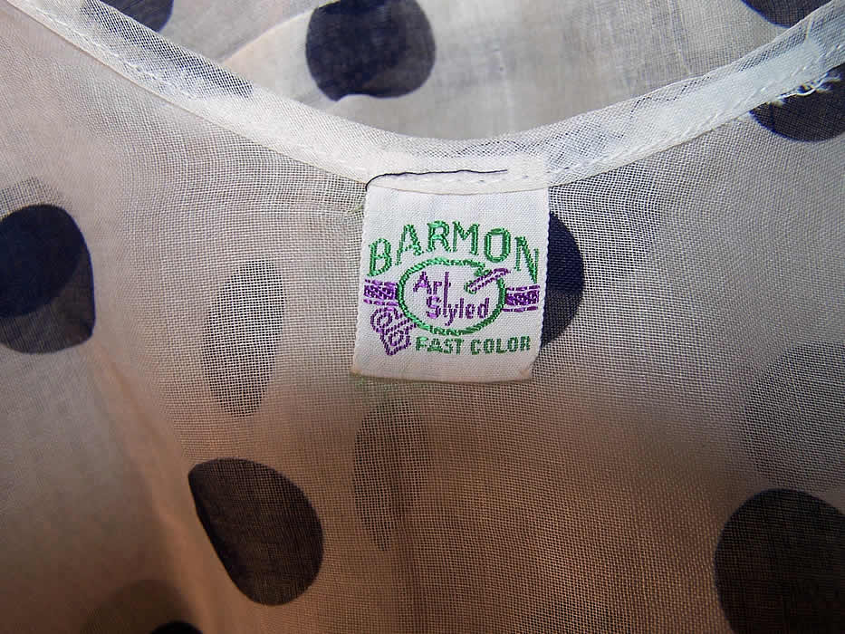 Vintage Barmon White Organdy Navy Polka Dot Bias Cut Dress close-up view.