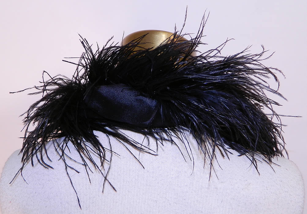 Victorian Black Ostrich Feather Neck Boa Collar Scarf Silk Ribbon Ties. This beautiful boa, neck collar style small stole scarf measures 64 inches long with the ribbon ties and 30 inches long without just the feather boa. It is in good condition, with only some slight molting of feathers. 