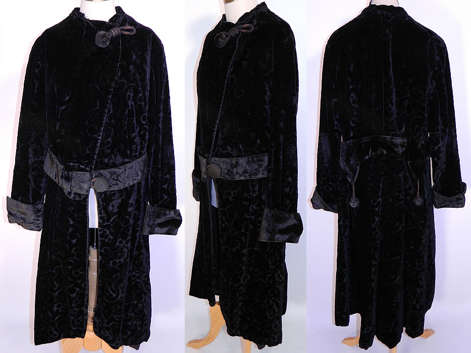 Edwardian Titanic Black Voided Velvet Winter Coat Evening Jacket. This antique Edwardian Titanic era black voided velvet winter coat evening jacket dates from 1912. It is made of a black silk velvet fabric, with voided cut out circular spiral pattern design. 