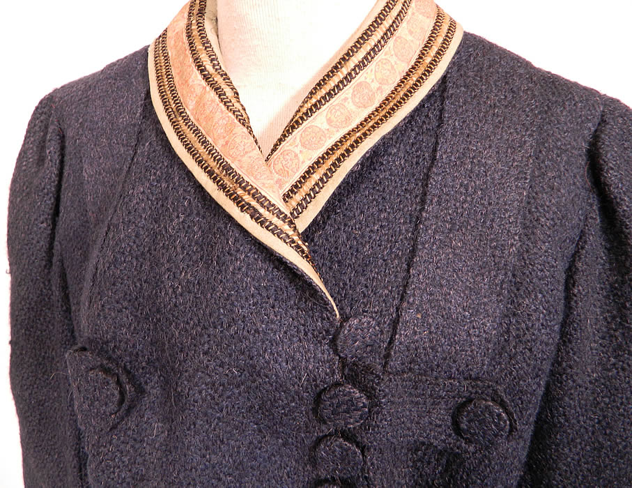 Edwardian Navy Blue Boucle Knit Wool Walking Suit Dress Bodice & Skirt. The bodice measures 18 inches long, with a 30 inch waist, 36 inch bust, 14 inch back and 24 inch long sleeves. There is a matching fabric long floor length full skirt, with decorative wool panel strips button trim accents, side snap closures and is unlined. The skirt measures 41 inches long, with 38 inch hips and a 24 inch waist.