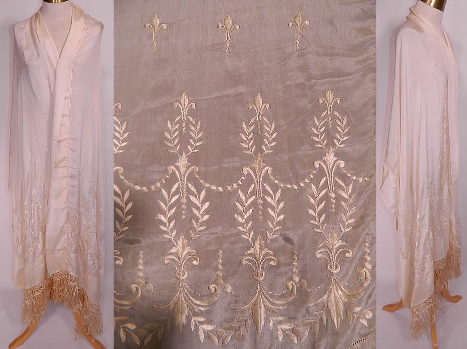 Antique Cream Silk Embroidered Fleur de Lis Wedding Shawl Scarf. This antique Edwardian era cream silk embroidered fleur de lis wedding shawl scarf dates from 1910. It is made of an off white cream color fine silk fabric, with raised padded satin stitch hand embroidery work done in decorative fleur de lis designs on the two bottom ends.