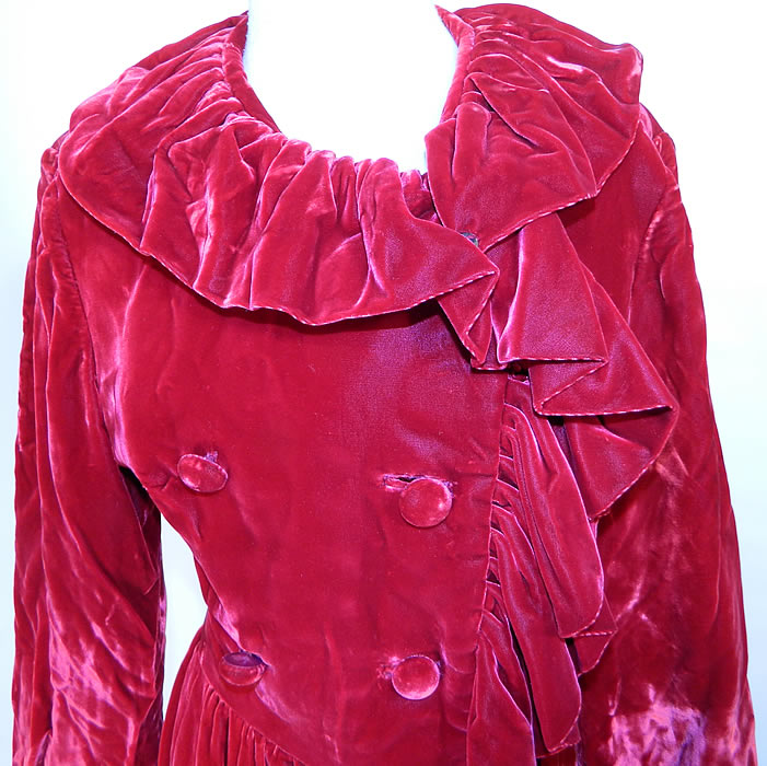 Vintage Donald Brooks Red Velvet Ruffle Double Breasted Evening Dress Coat. The dress measures 37 inches long, with 36 inch hips, a 26 inch waist, 38 inch bust, 15 inch back and 22 inch long sleeves. 