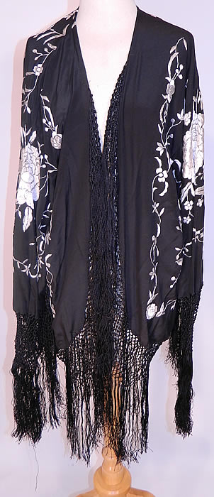 Vintage Black & White Silk Floral Embroidered Piano Shawl Fringe Robe Coat. The robe measures 27 inches long, with 45 inch hips, waist and bust. It is in good condition. This is truly a wonderful piece of wearable Art Deco textile art! 