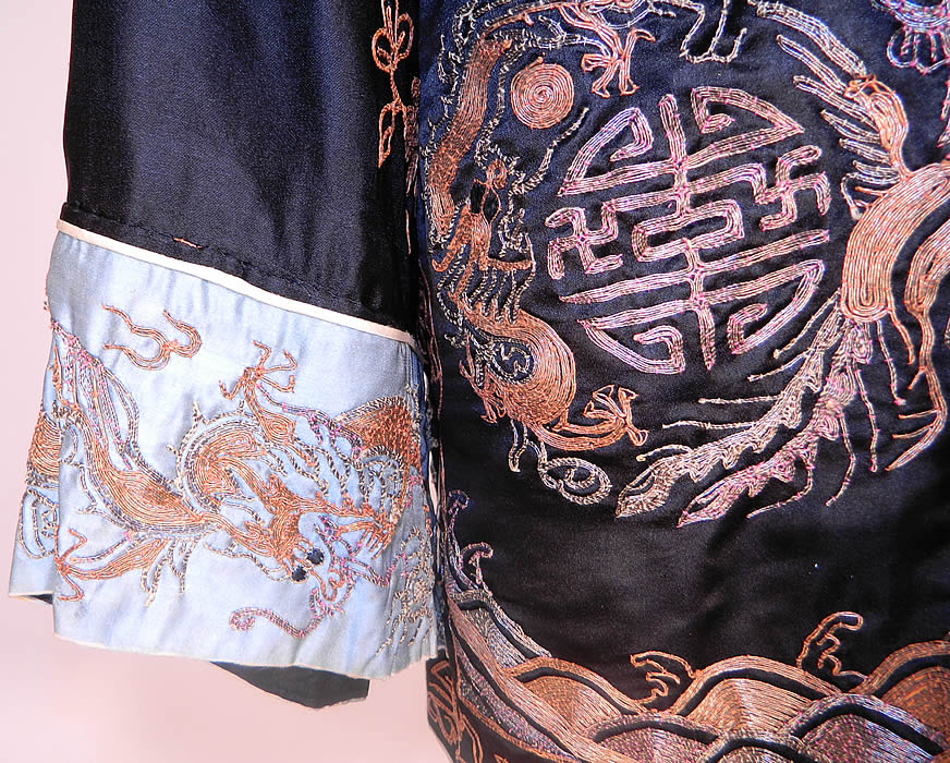 Vintage Chinese Couching Embroidered Ji Luck Phoenix Dragon Robe Jacket. There are embroidered phoenix birds, dragons, Ji symbol for luck, auspicious precious objects and waves of water along the bottom. 