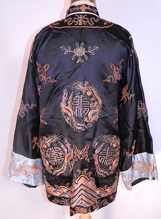 Vintage Chinese Couching Embroidered Ji Luck Phoenix Dragon Robe Jacket. They also signify husband and wife and wedded bliss. This short jacket style robe has a mandarin collar neckline, blue silk sleeve cuffs with dragons and carved round brass button loop toggles for closure down the front.